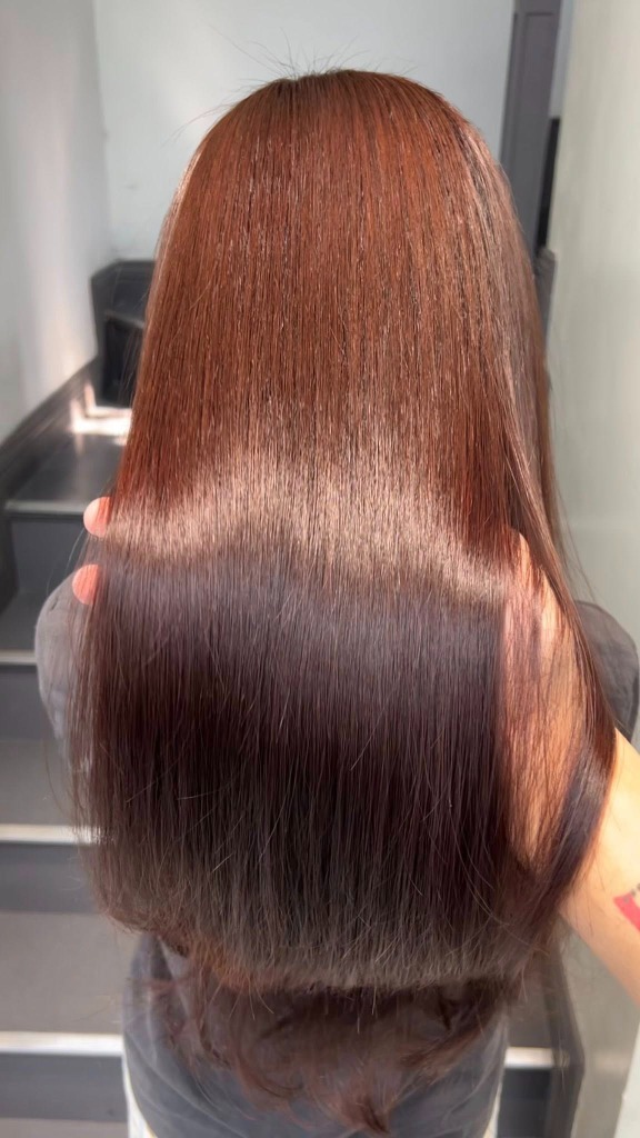 Màu tóc nâu socola ánh ấm bóng mượt tại Kim Loan Hair Salon