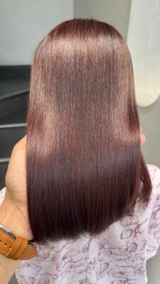 Mái tóc nhuộm màu nâu công sở bóng khỏe như lụa tại Kim Loan Hair Salon